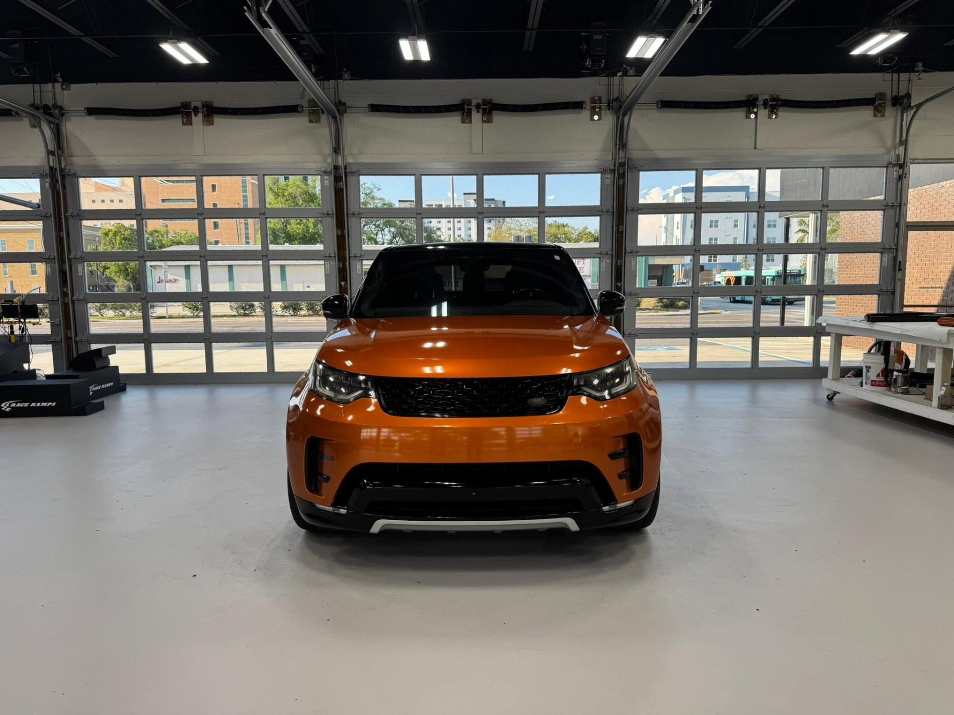 Land Rover Discovery in a burnt orange color change wrap